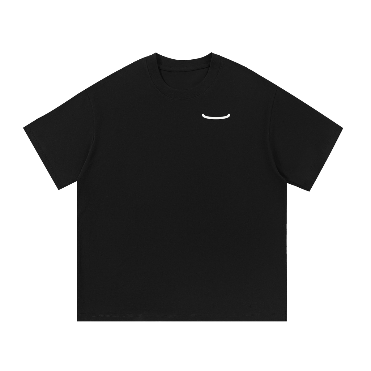 The Arc Tee in black, front: a small bone smile arc on the left chest of a heavyweight cotton t-shirt