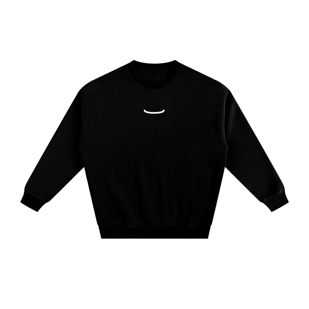 The Arc Crewneck in Ink, front: black heavyweight crewneck sweatshirt with one small bone smile arc centred on the chest